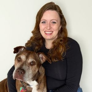 Sara Miller with a dog