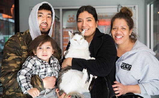 Family with cat at adoption