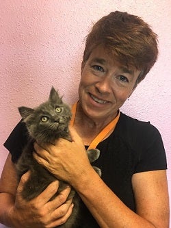 Paula Powell holding cat