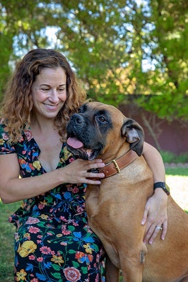 Woman with big brown dog