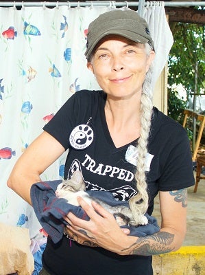 Woman holding kitten