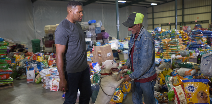 man receiving help at pet food bank