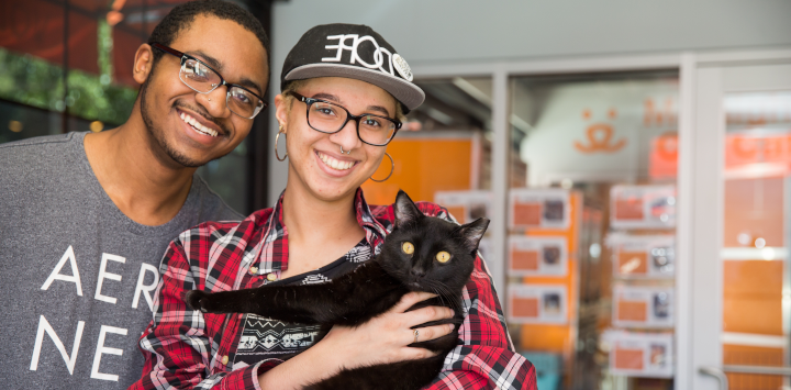 Couple with adopted cat