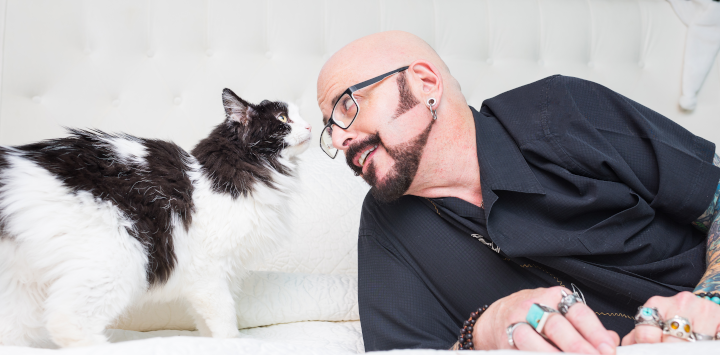 Jackson Galaxy and a black and white cat